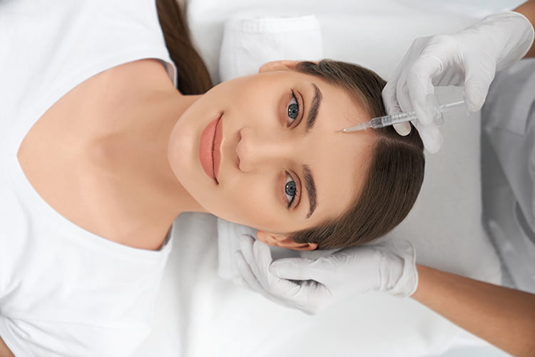 Bild zeigt Frau vor Botox Behandlung